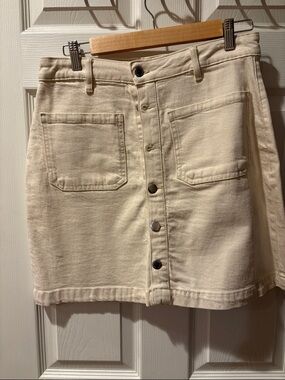 Button-Front Mini Skirt in Cream